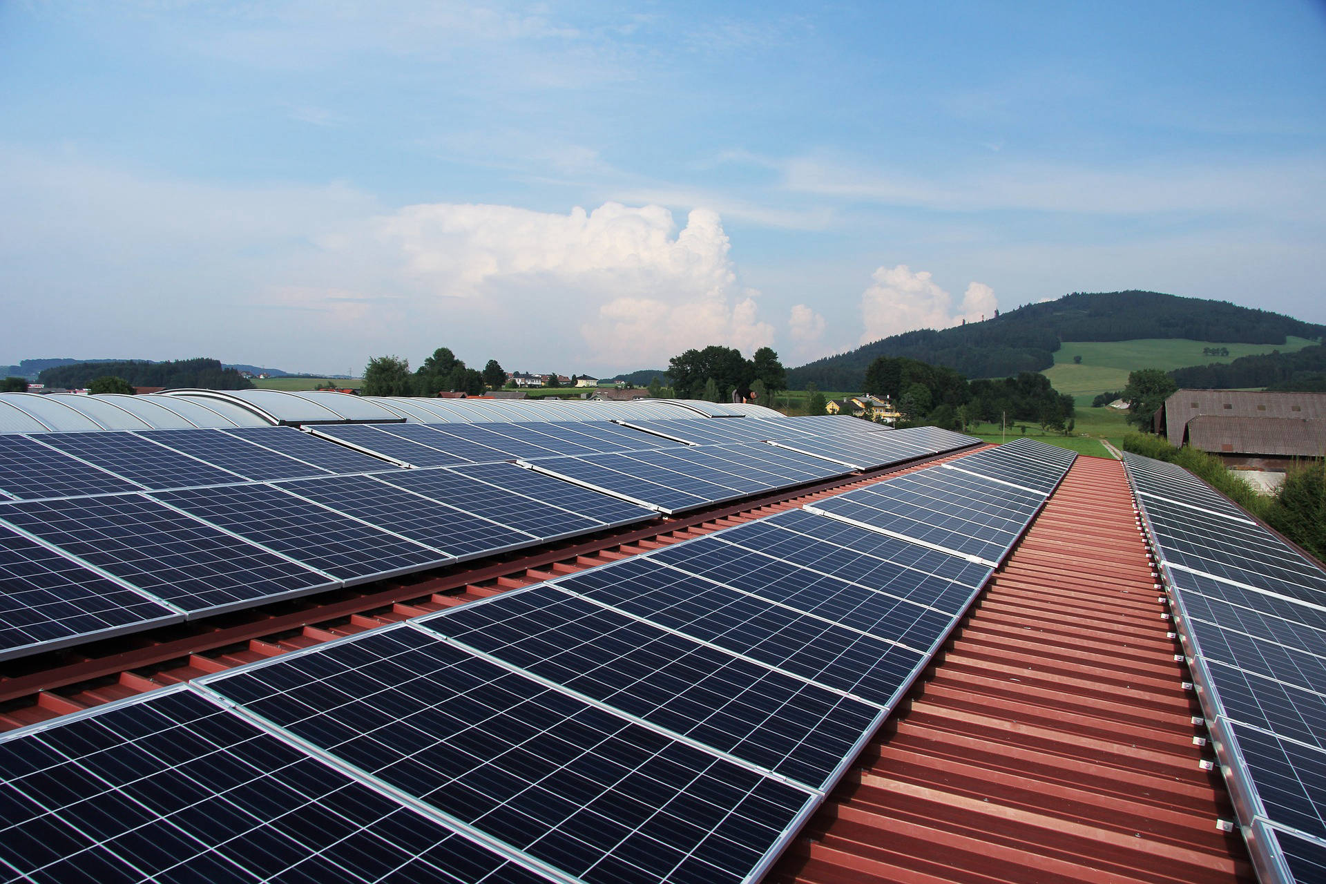 Solar industry accreditation logos including MCS displayed on an installer's documentation