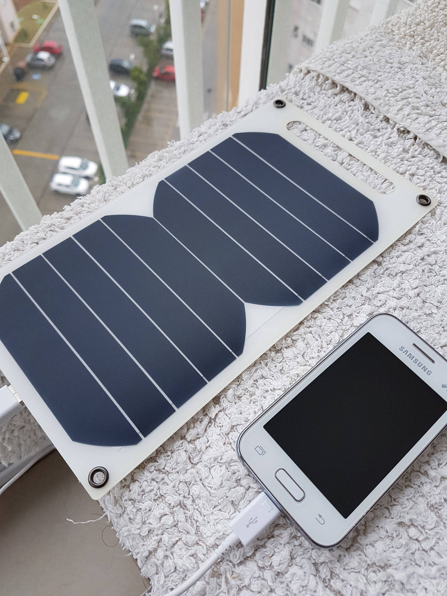 Homeowner reviewing solar energy savings on a smart meter display